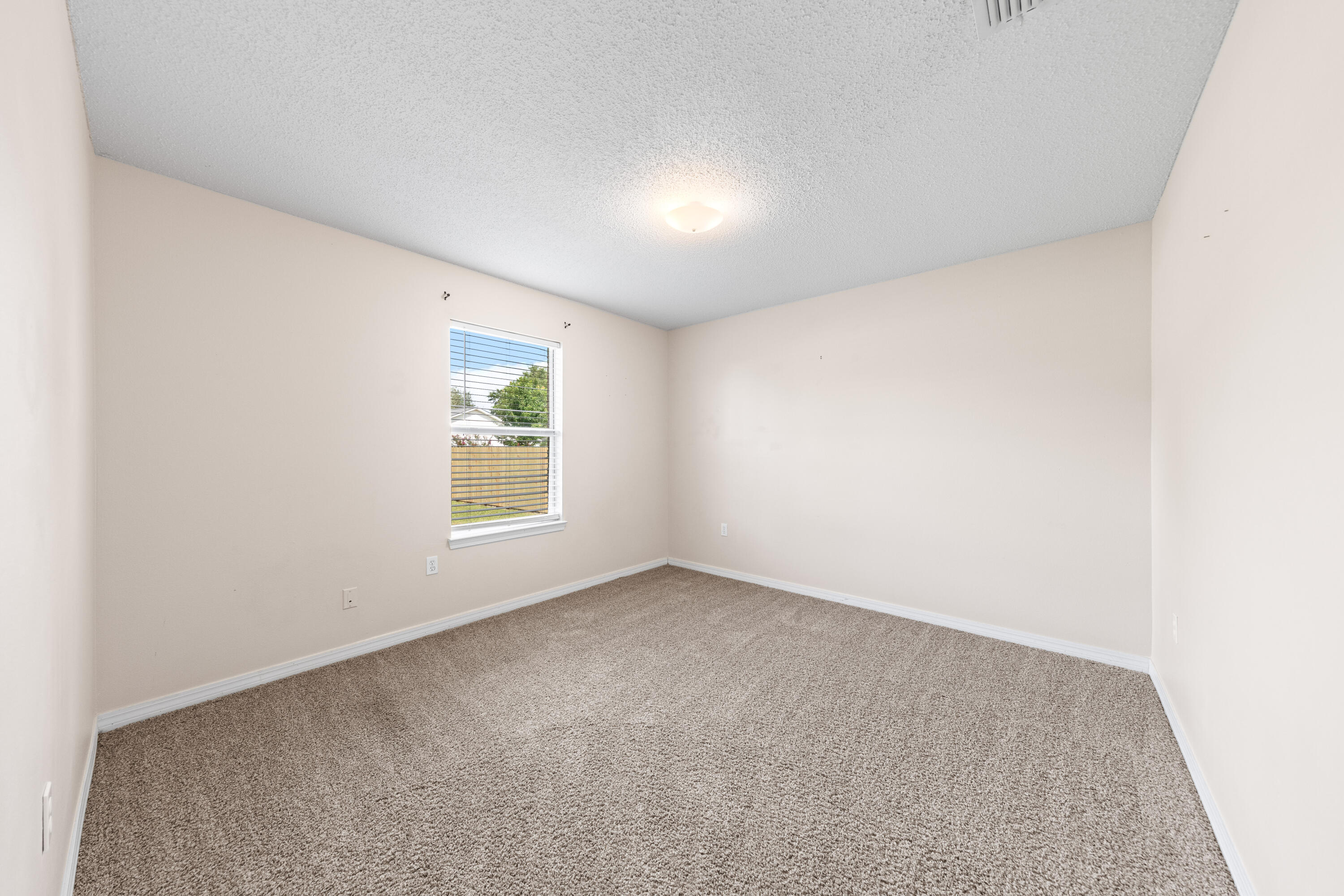275 Limestone Circle Crestview, FL 32539 - Photo 28 of 45 an empty room with windows