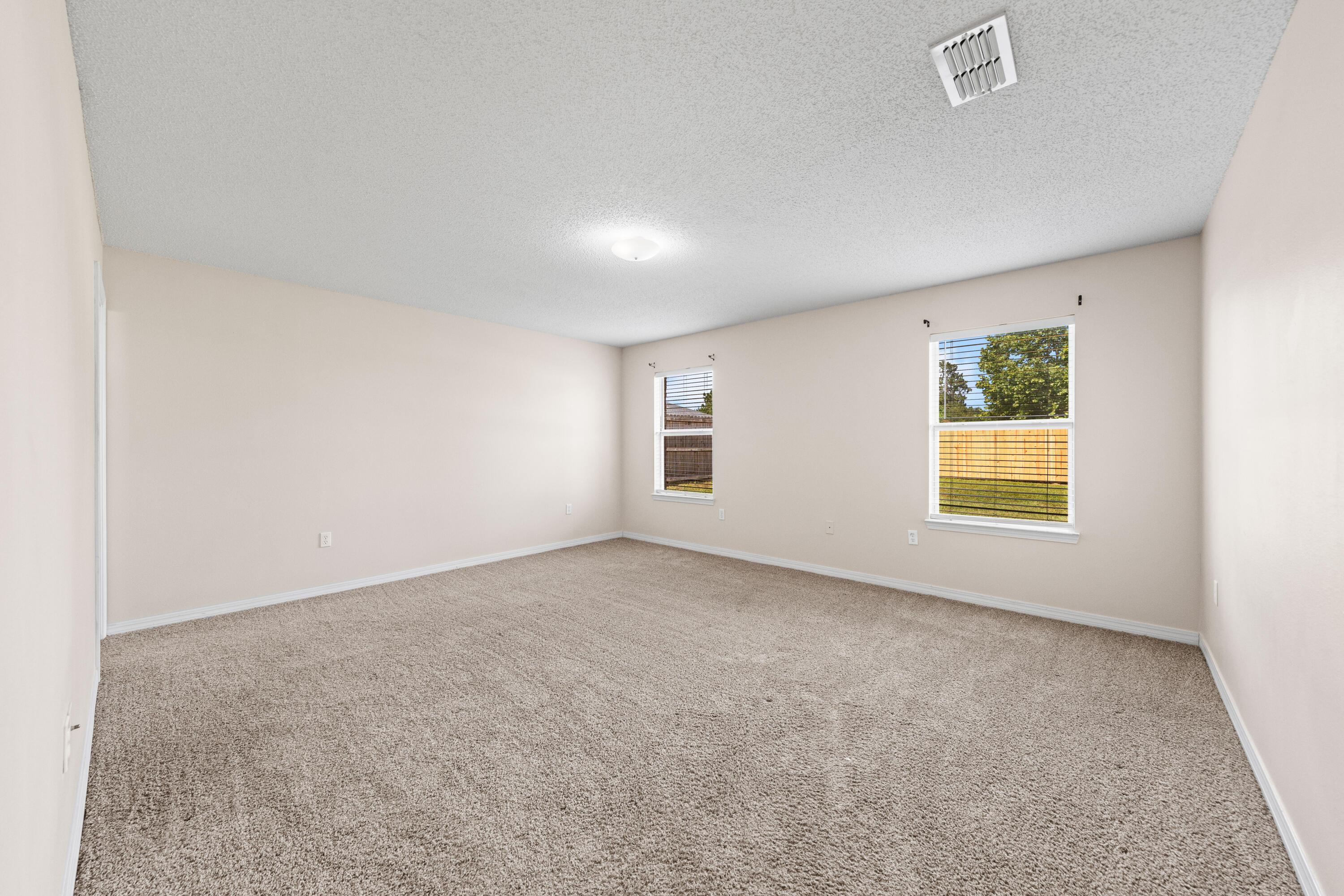 275 Limestone Circle Crestview, FL 32539 - Photo 31 of 45 an empty room with windows