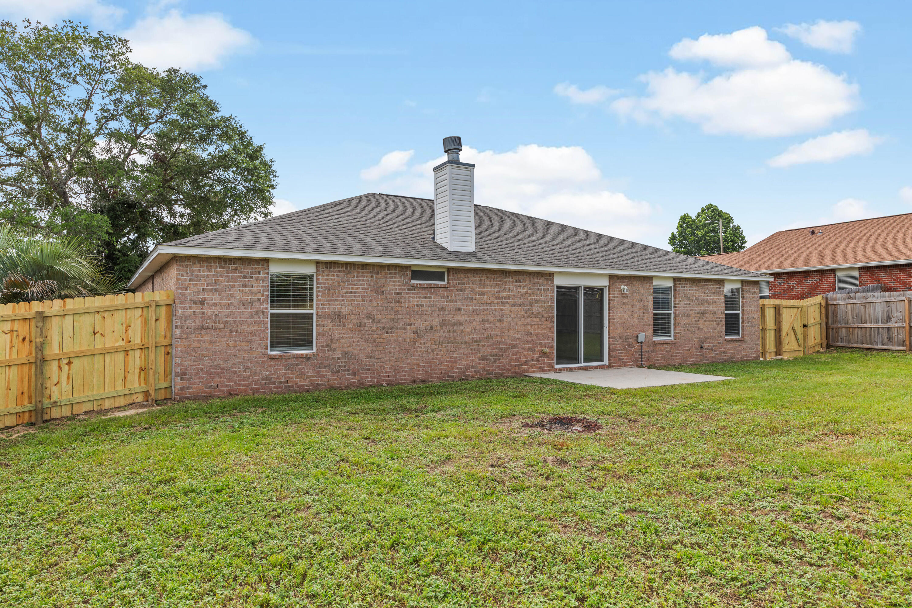 275 Limestone Circle Crestview, FL 32539 - Photo 43 of 45 a front view of a house with a garden