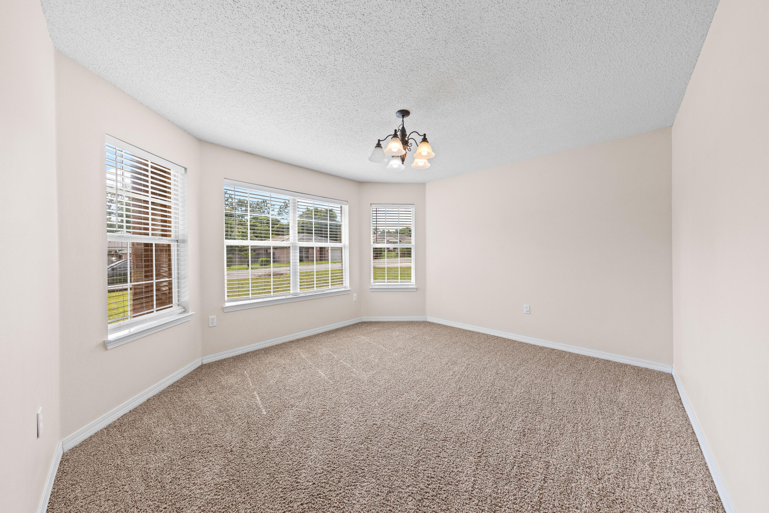 275 Limestone Circle Crestview, FL 32539 - Photo 6 of 45 an empty room with windows
