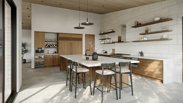 a kitchen with stainless steel appliances kitchen island granite countertop a table chairs sink and cabinets