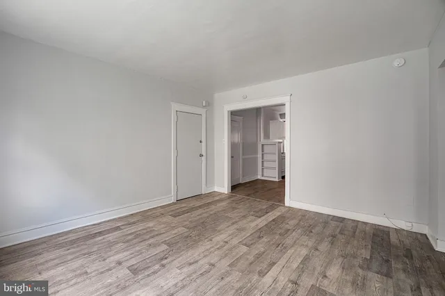 a view of an empty room and window