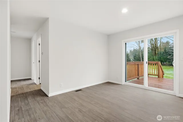 a bathroom with a double vanity sink and mirror