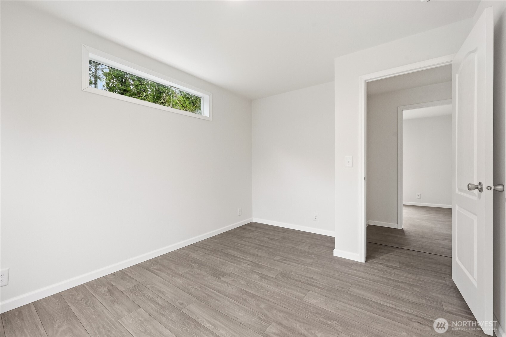30 Porter Creek Road Elma, WA 98541 - Photo 27 of 33 a view of an empty room with wooden floor