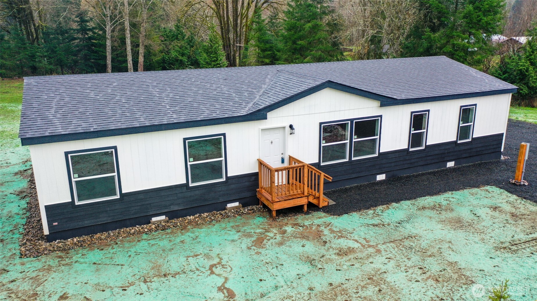 30 Porter Creek Road Elma, WA 98541 - Photo 4 of 33 a aerial view of a house with a yard and wooden fence