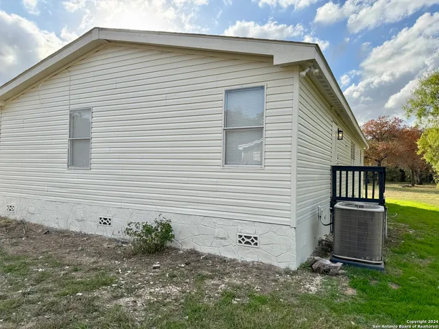 a view of backyard of house