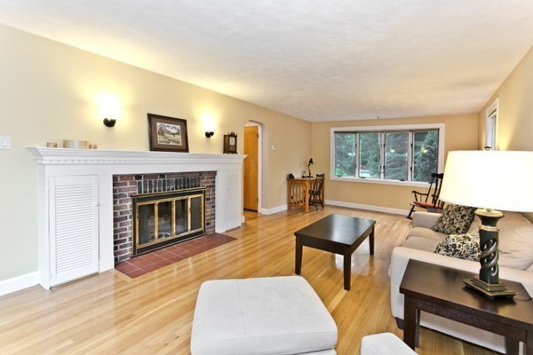 20 Spring Street Wakefield, MA 01880 - Photo 11 of 30 a living room with furniture and a fireplace