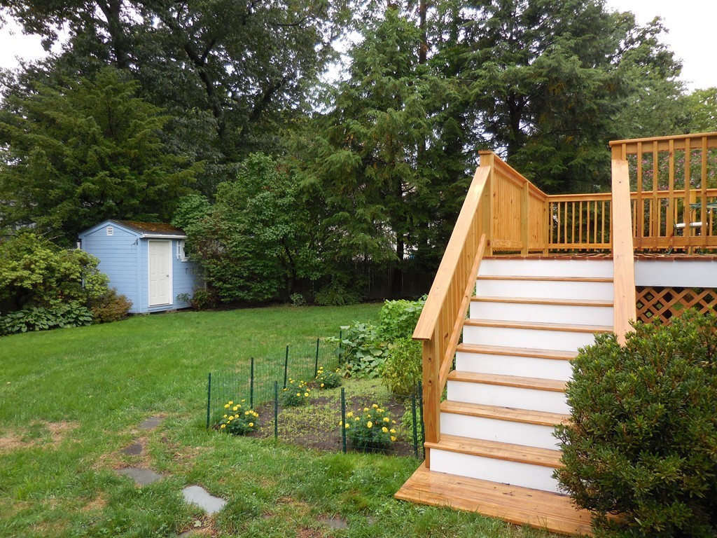 20 Spring Street Wakefield, MA 01880 - Photo 29 of 30 a view of a house with backyard and trees