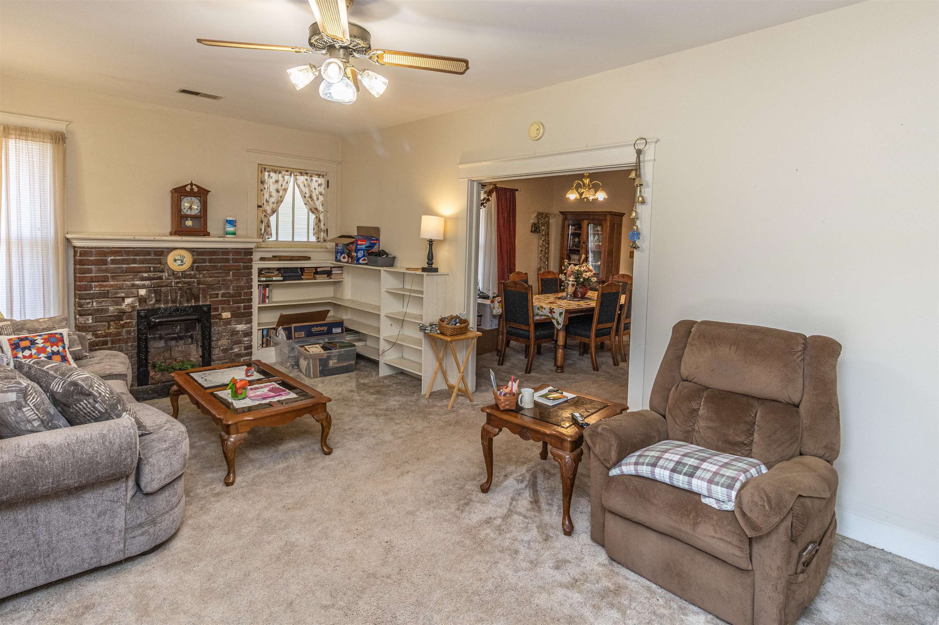 11945 Peavine Road Pocahontas, TN 38061 - Photo 11 of 23 a living room with furniture and a fireplace