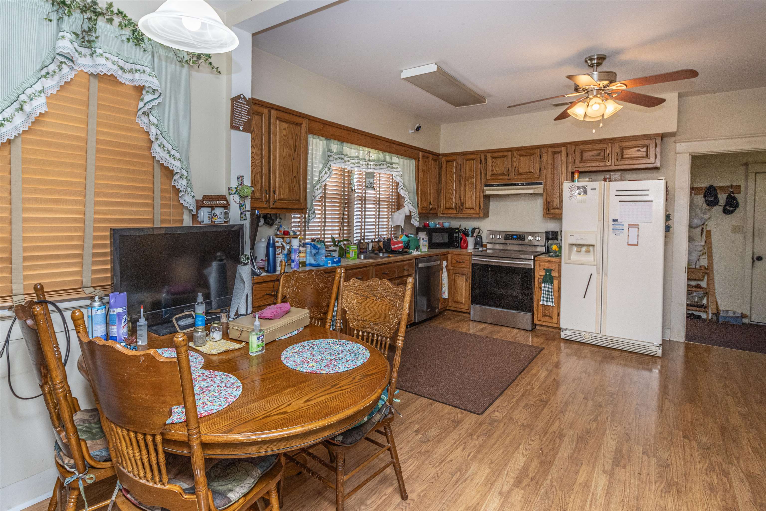 11945 Peavine Road Pocahontas, TN 38061 - Photo 12 of 23 a view of a dining room with furniture window and wooden floor