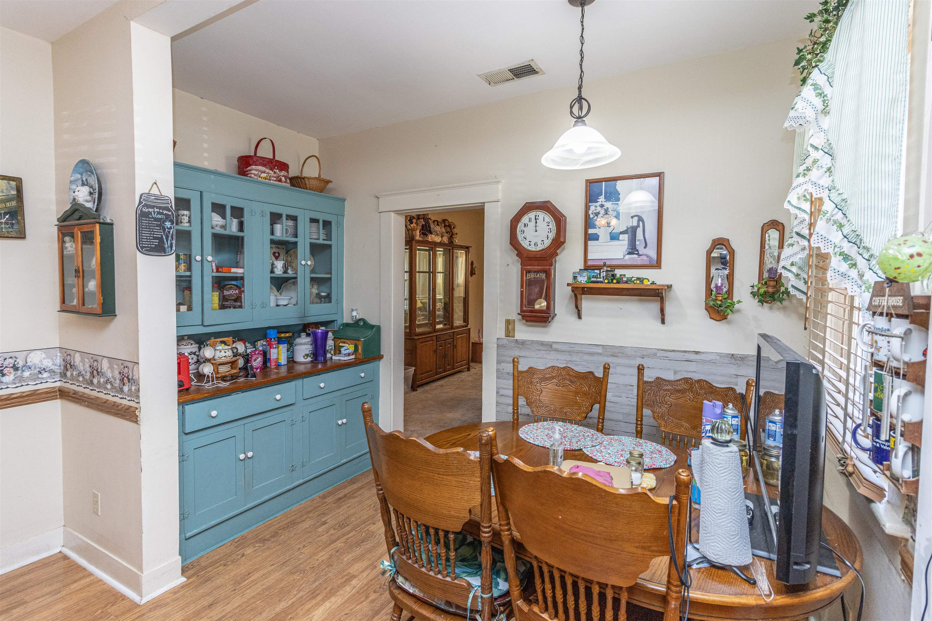 11945 Peavine Road Pocahontas, TN 38061 - Photo 13 of 23 a dining room with furniture and wooden floor