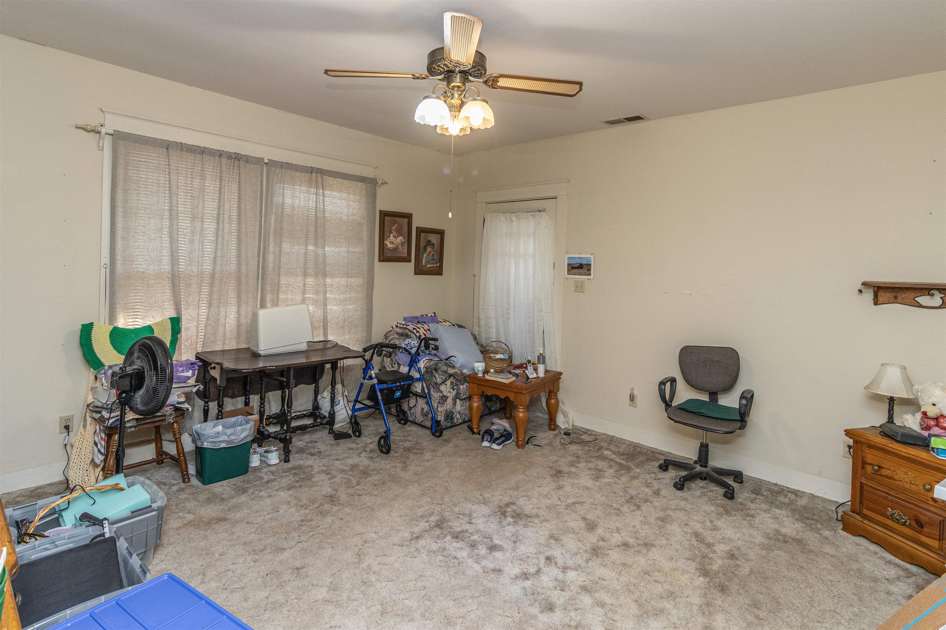 11945 Peavine Road Pocahontas, TN 38061 - Photo 16 of 23 a living room with furniture and a potted plant