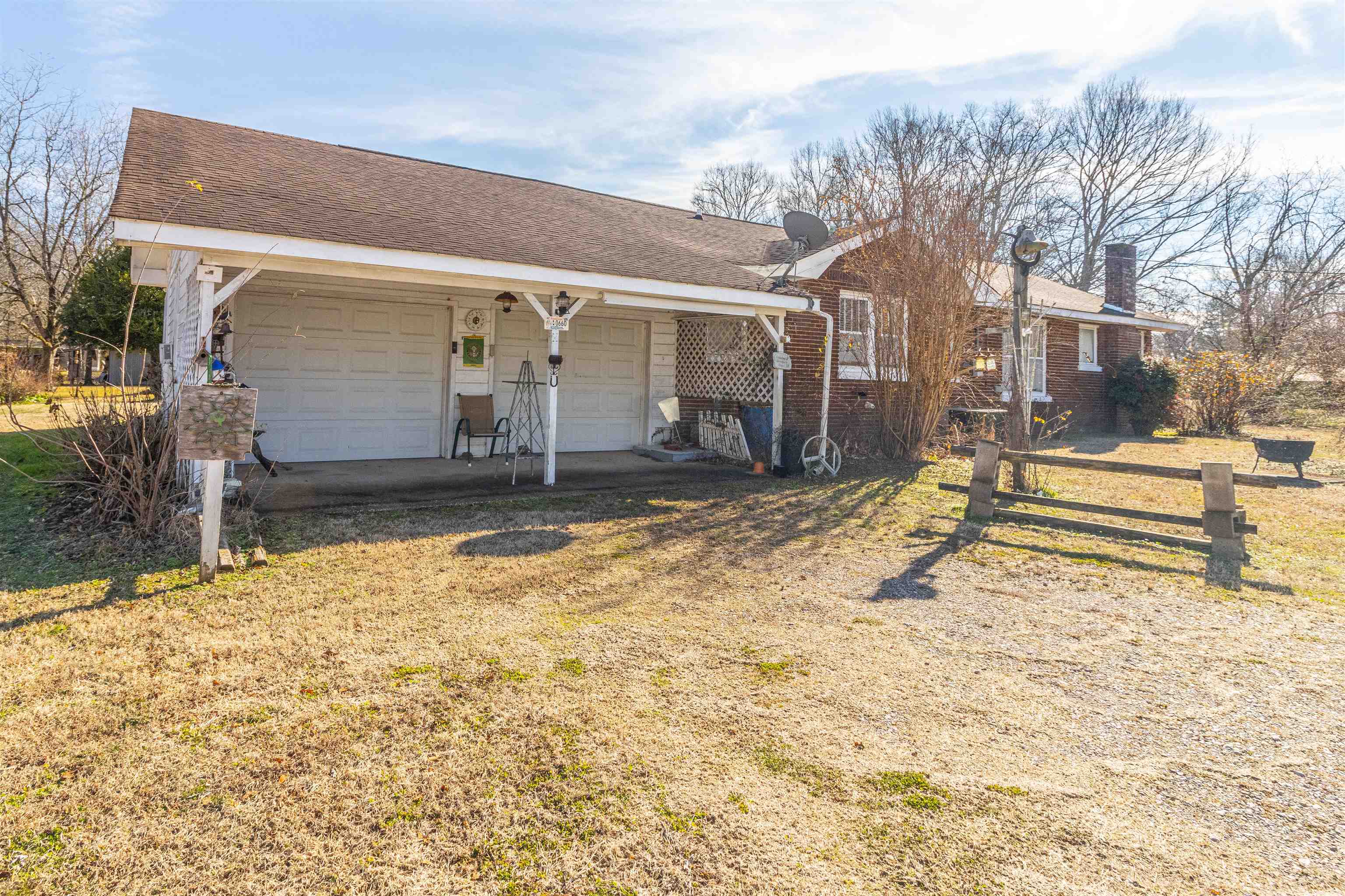 11945 Peavine Road Pocahontas, TN 38061 - Photo 5 of 23 a view of a house with snow on the wall