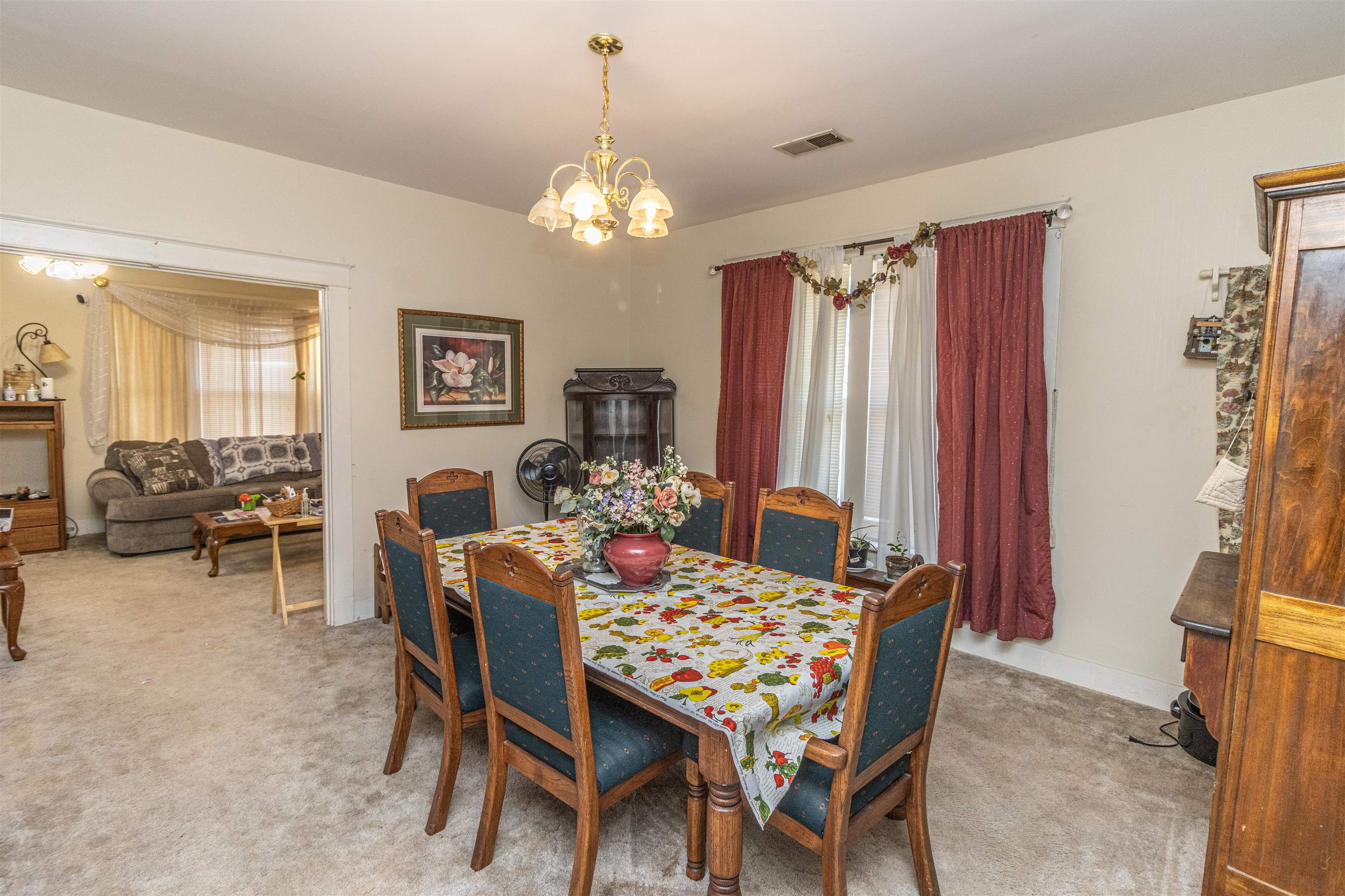 11945 Peavine Road Pocahontas, TN 38061 - Photo 9 of 23 a view of a dining room with furniture and a chandelier