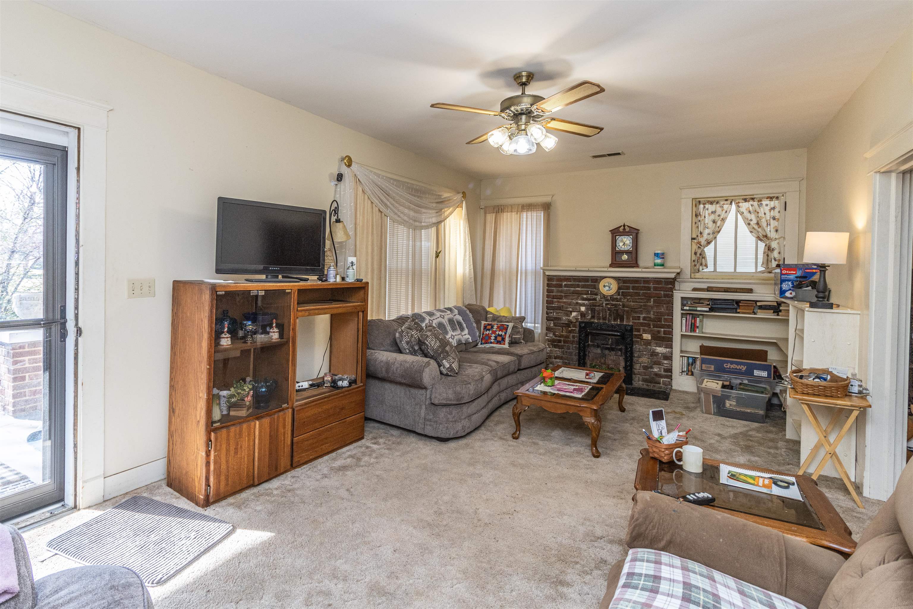 11945 Peavine Road Pocahontas, TN 38061 - Photo 10 of 23 a living room with furniture and a flat screen tv
