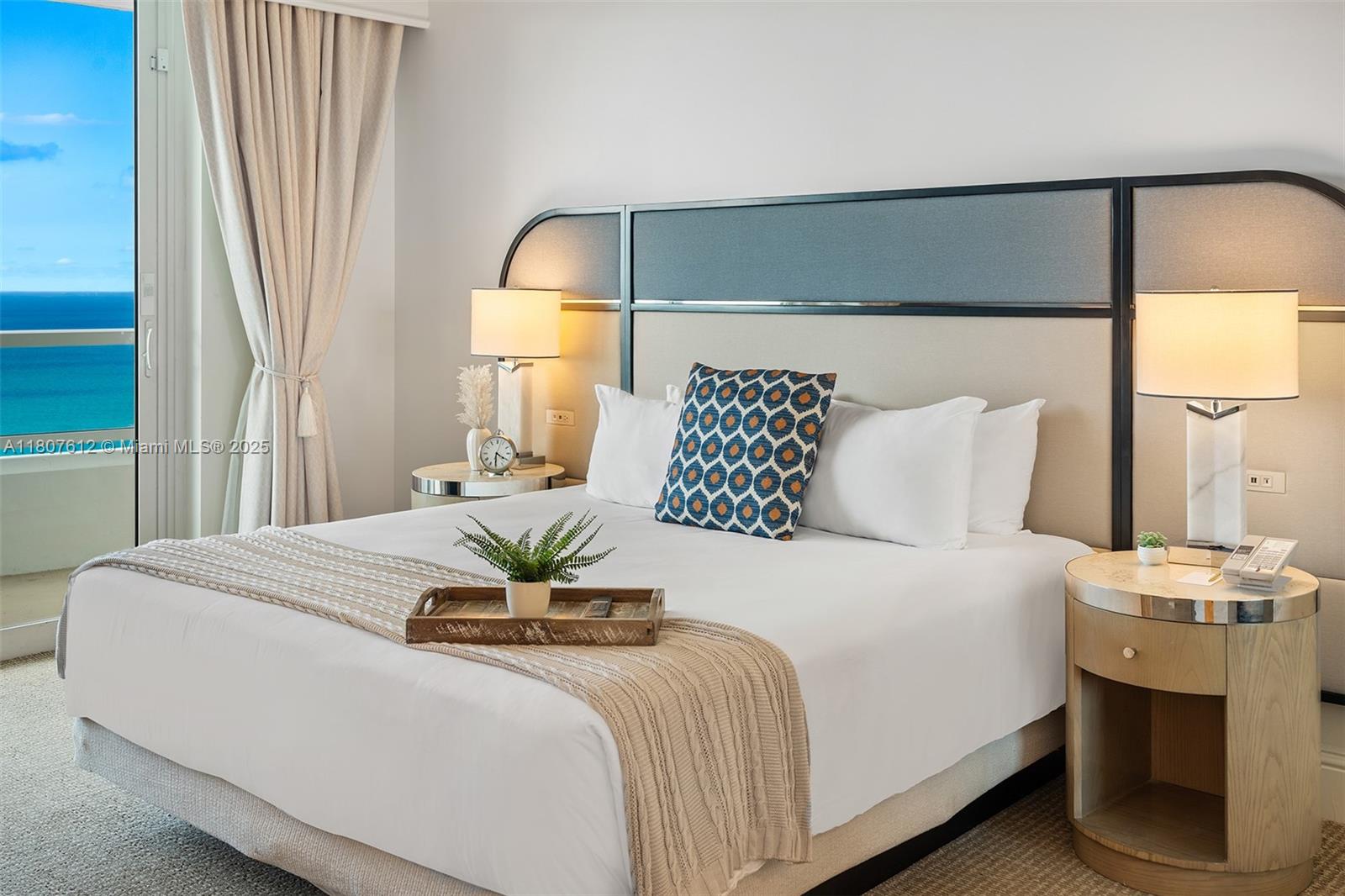 4401 Collins Avenue, Unit 3505 Miami Beach, FL 33140 - Photo 13 of 27 a bedroom with a bed and a couch