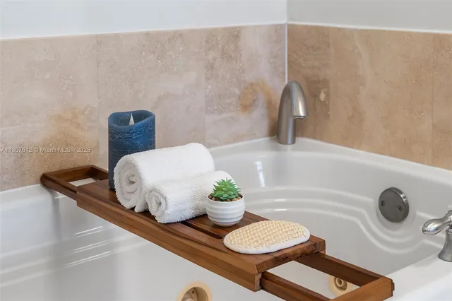 a view of a storage & utility room with washer and dryer