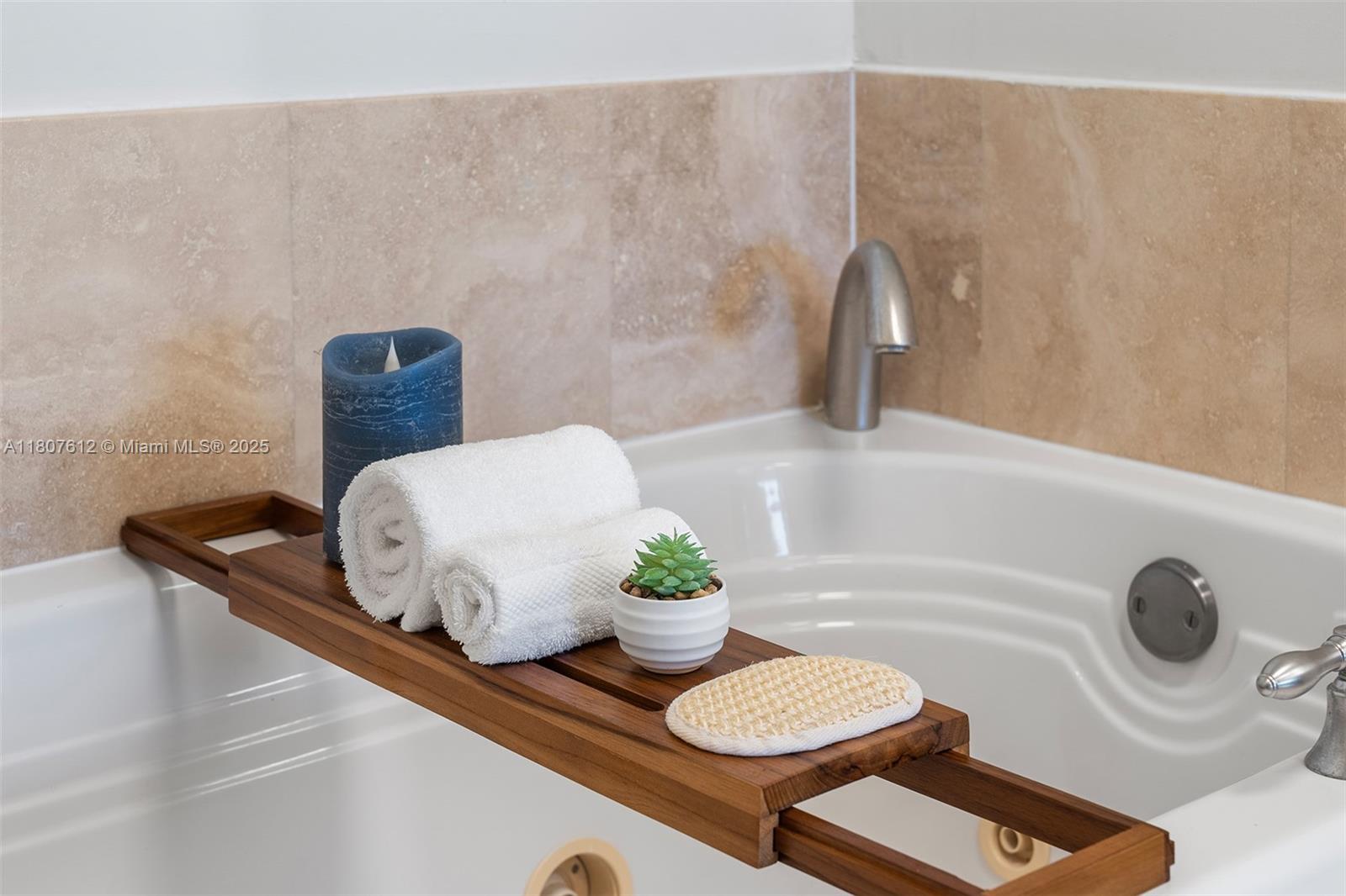 4401 Collins Avenue, Unit 3505 Miami Beach, FL 33140 - Photo 20 of 27 a bathroom with a sink a toilet and a mirror