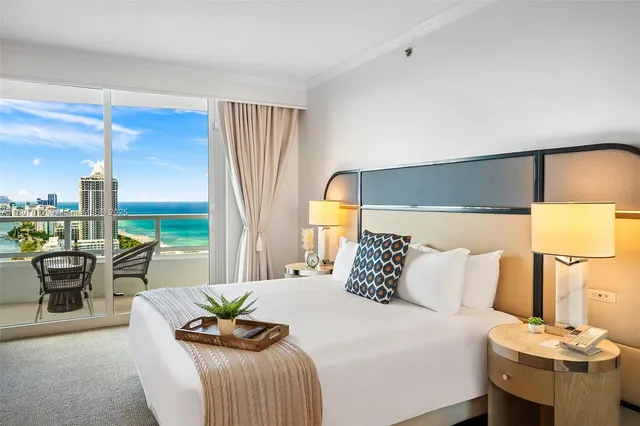 a bathroom with a sink a tub and a mirror