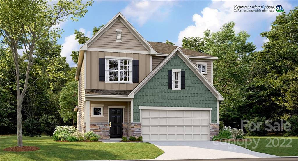 5777 Soft Shell Drive, Unit 309 Lancaster, SC 29720 - Photo 21 of 21 a front view of a house with a yard