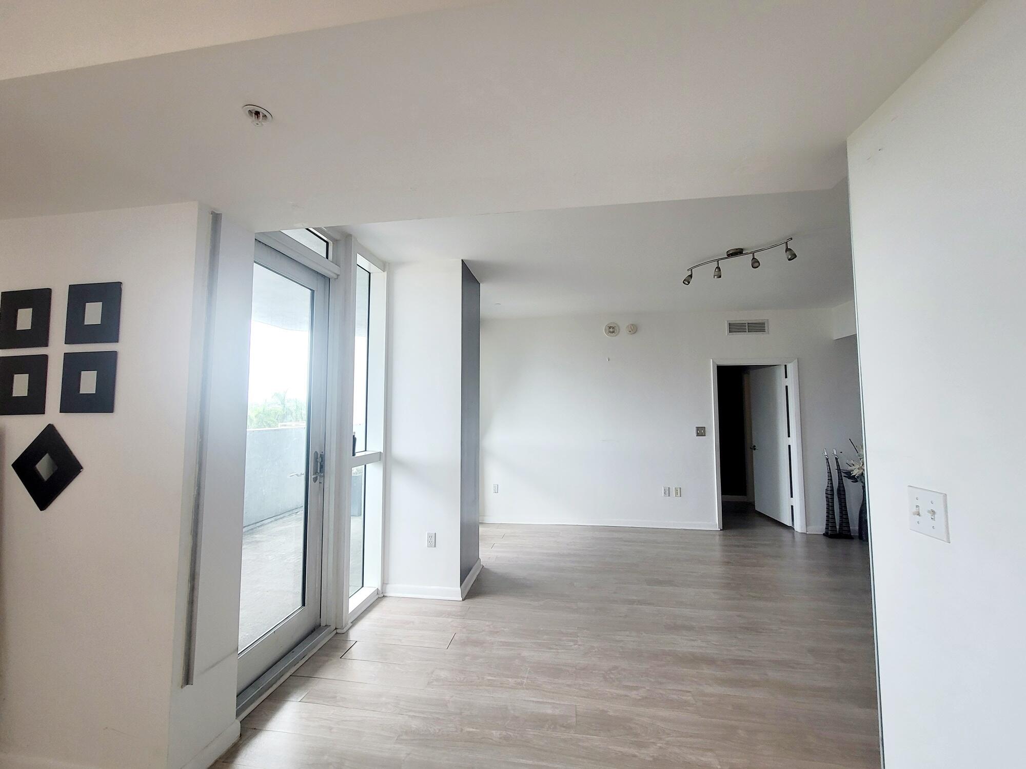 244 Biscayne Boulevard, Unit 401 Miami, FL 33132 - Photo 22 of 36 a view of an empty room