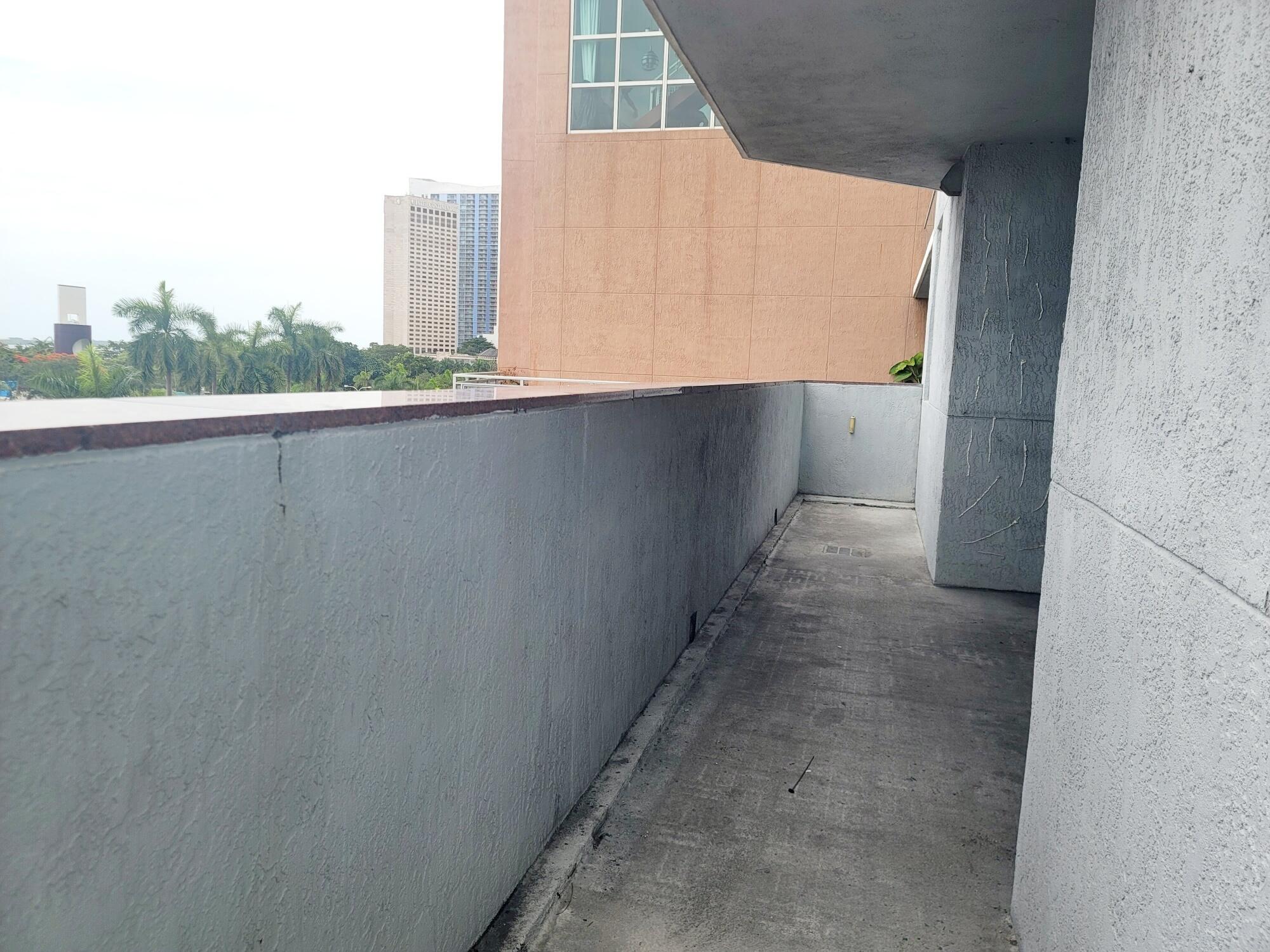 244 Biscayne Boulevard, Unit 401 Miami, FL 33132 - Photo 29 of 36 a view of a building from a balcony