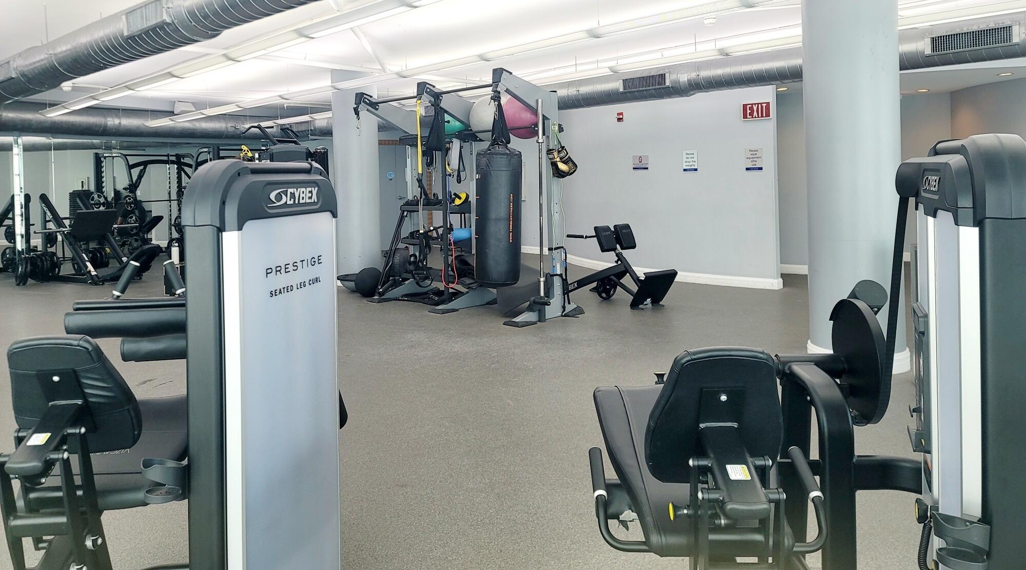 244 Biscayne Boulevard, Unit 401 Miami, FL 33132 - Photo 3 of 36 a view of a room with gym equipment