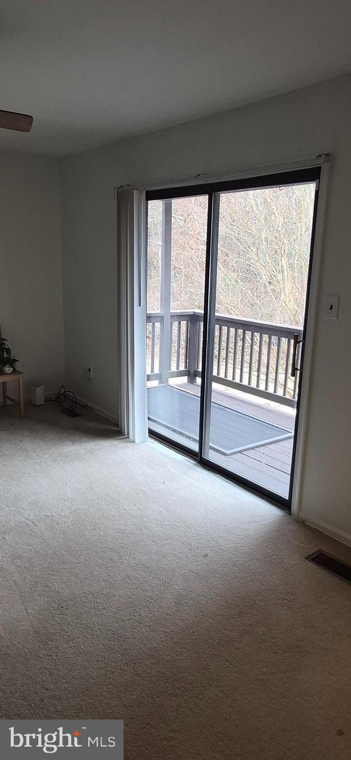 8 Del Sol Place Sicklerville, NJ 08081 - Photo 24 of 40 a view of an empty room with a balcony
