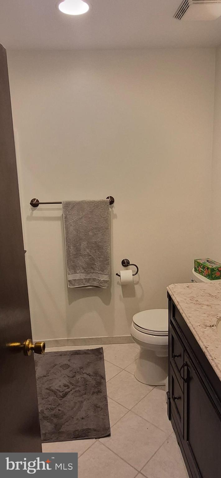 8 Del Sol Place Sicklerville, NJ 08081 - Photo 27 of 40 a bathroom with a granite countertop toilet and a sink