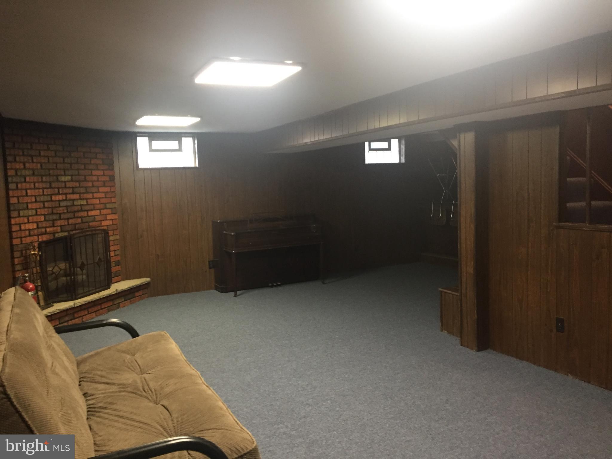 238 Candytuft Road Reisterstown, MD 21136 - Photo 11 of 18 Basement FAMILY ROOM WITH GAS FIREPLACE
