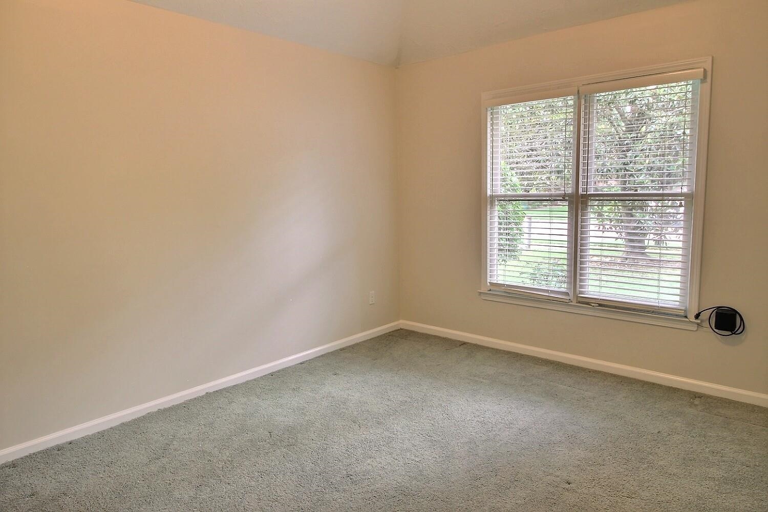 275 Home Place Collierville, TN 38017 - Photo 15 of 18 Carpeted empty room featuring baseboards