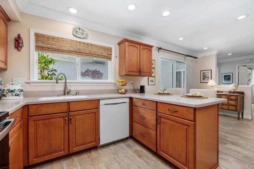 3709 Sesame Way Oceanside, CA 92057 - Photo 18 of 39 a kitchen with sink stove and cabinets