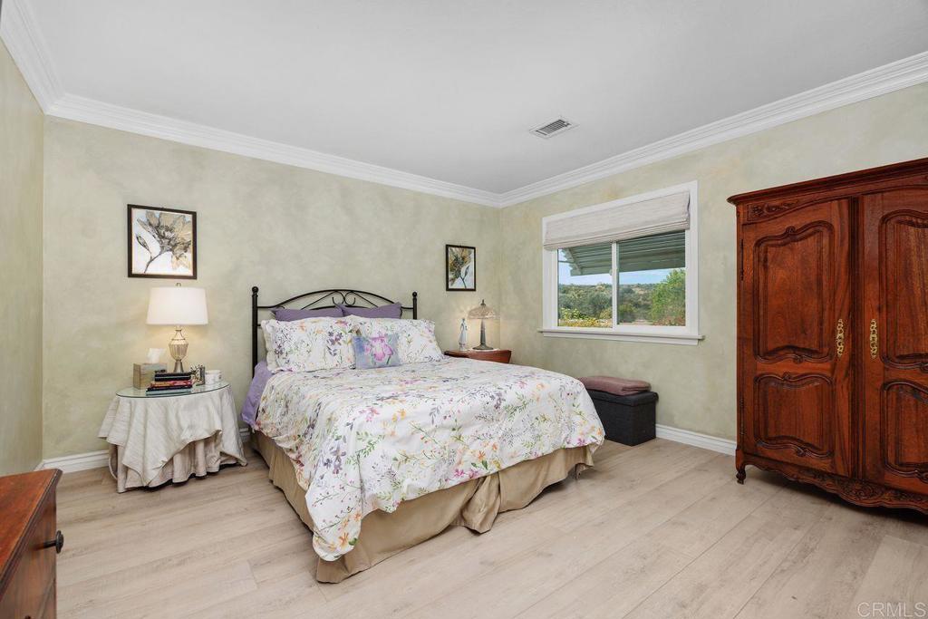 3709 Sesame Way Oceanside, CA 92057 - Photo 19 of 39 a bedroom with a bed and a window