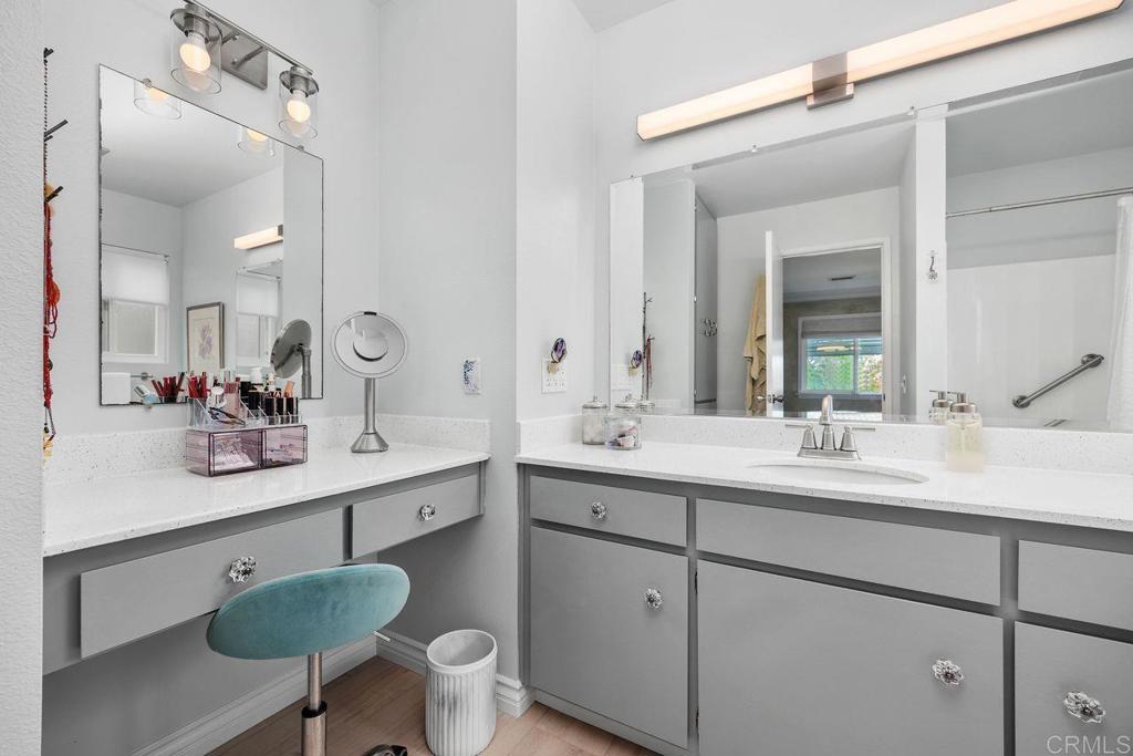 3709 Sesame Way Oceanside, CA 92057 - Photo 22 of 39 a bathroom with a sink double vanity and a mirror