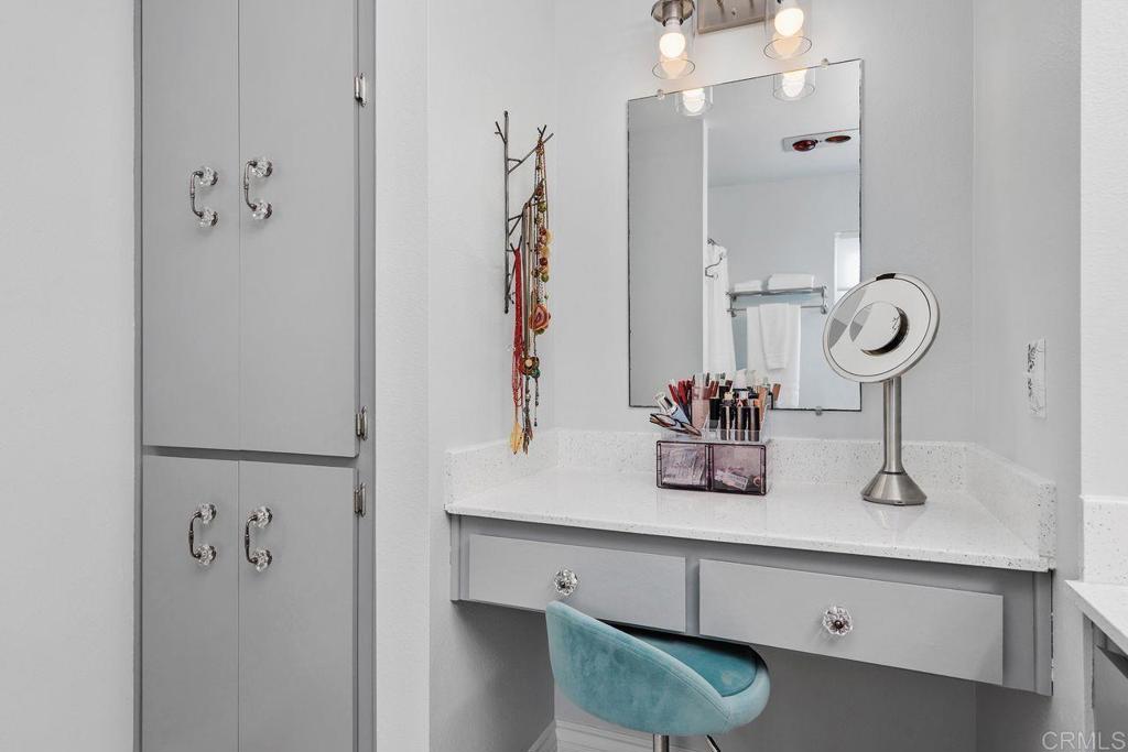 3709 Sesame Way Oceanside, CA 92057 - Photo 25 of 39 a bathroom with a sink and mirror