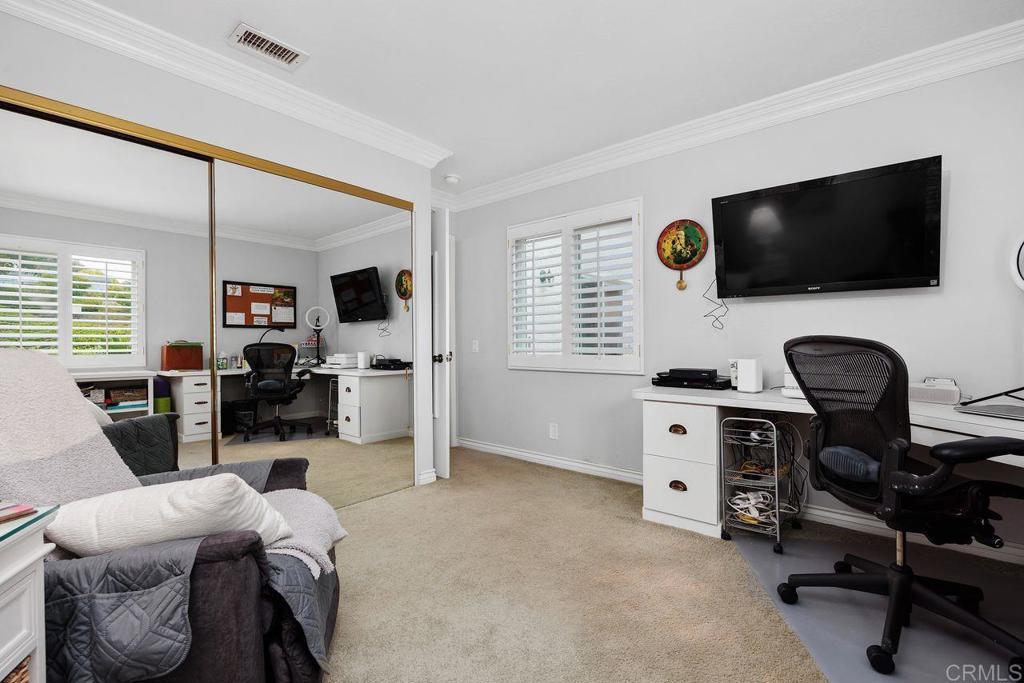 3709 Sesame Way Oceanside, CA 92057 - Photo 27 of 39 a view of a livingroom with workspace and a window