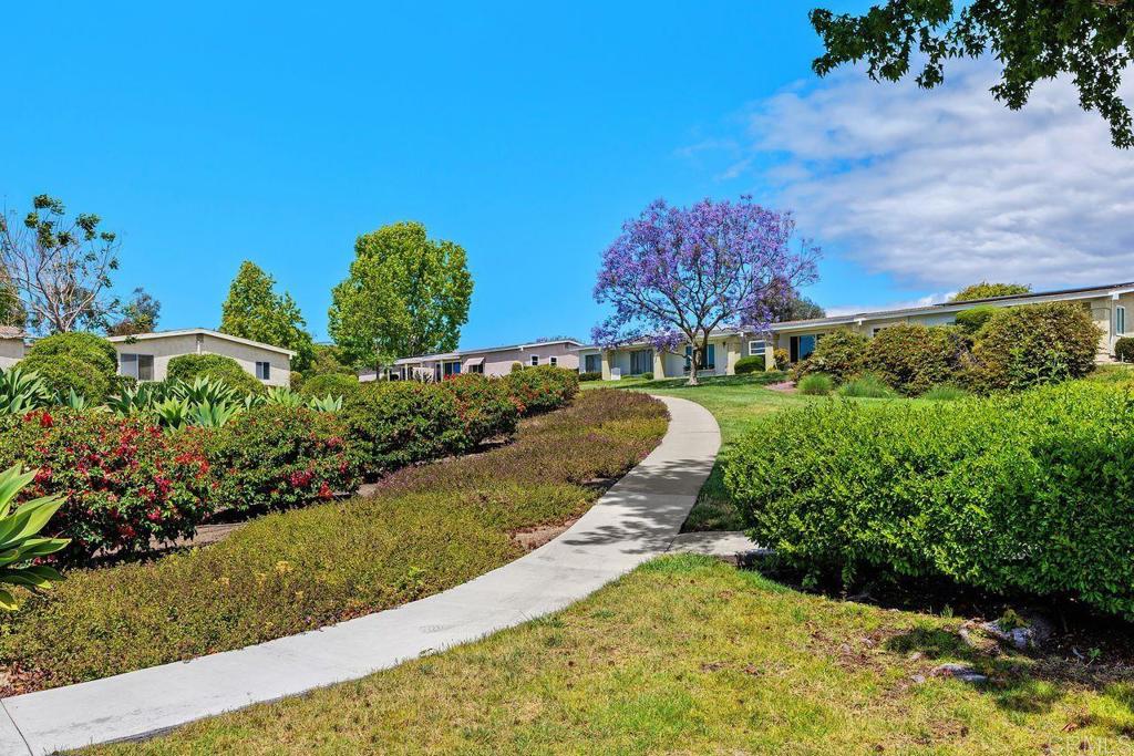 3709 Sesame Way Oceanside, CA 92057 - Photo 36 of 39 a view of a garden with a building in the background