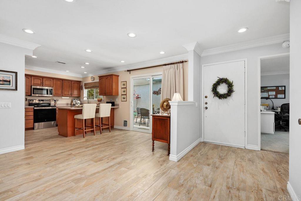 3709 Sesame Way Oceanside, CA 92057 - Photo 7 of 39 a view of a living room kitchen and a window