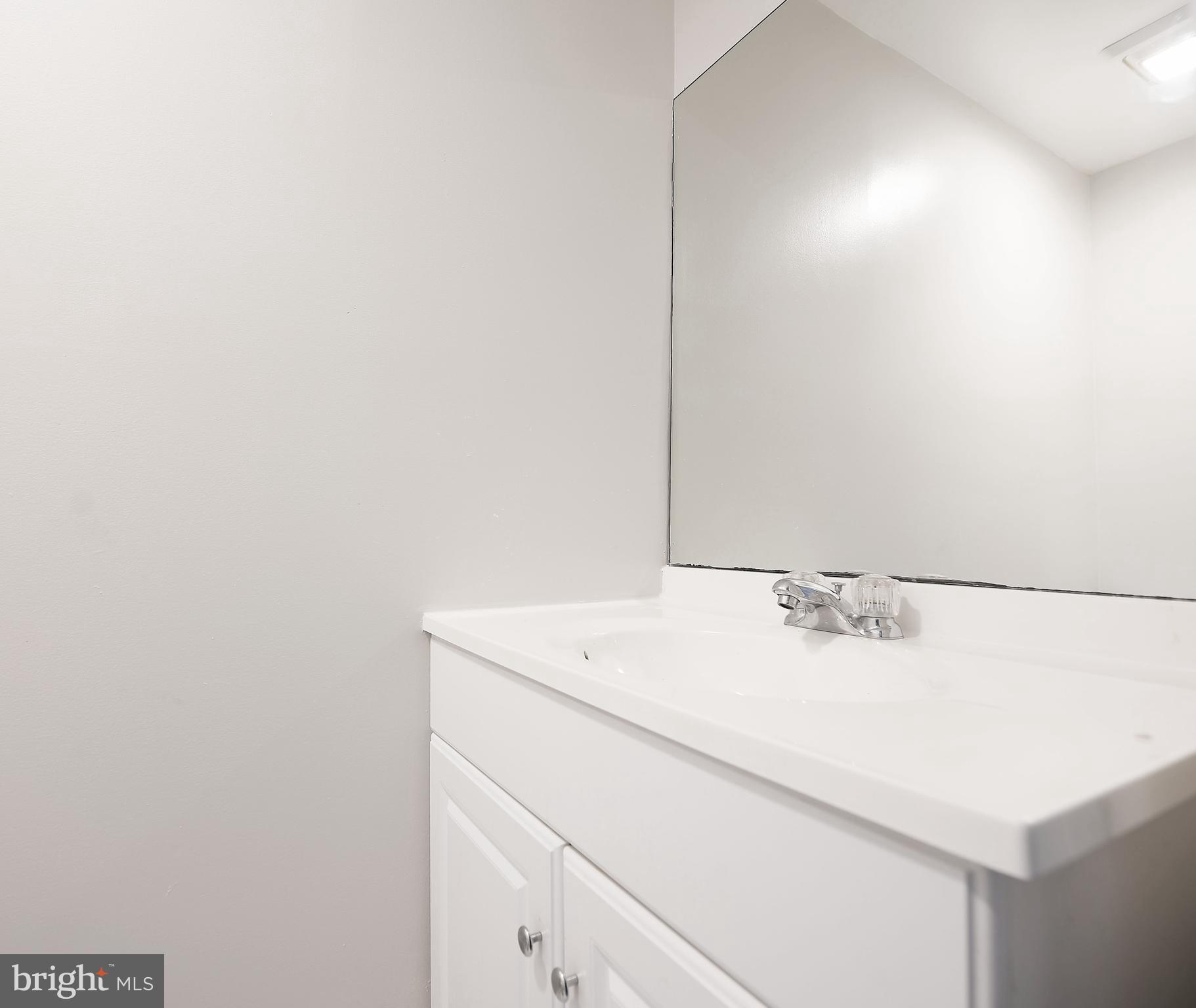 1916 Oxley Road Baltimore, MD 21222 - Photo 16 of 27 HALF BATHROOM IN LOWER LEVEL