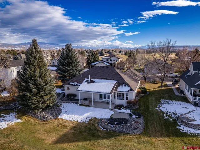 a aerial view of a house with a garden