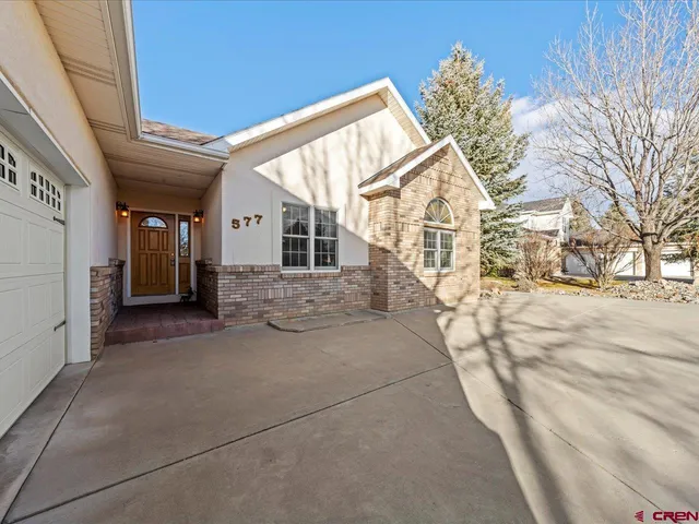 a view of a house with a snow