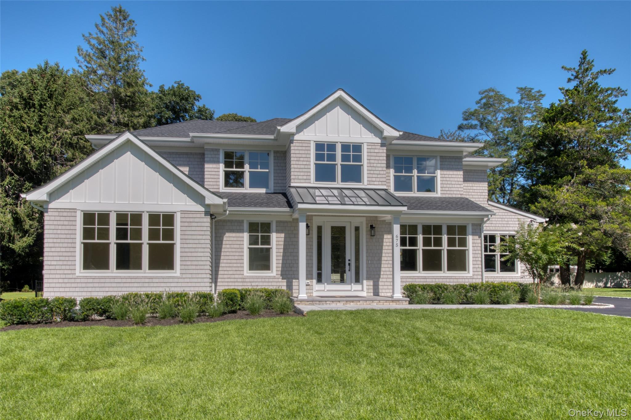 675 Pine Tree Road Cutchogue, NY 11935 - Photo 1 of 1 Front facade of new luxury home at 675 Pine Tree Rd., Cutchogue NY
