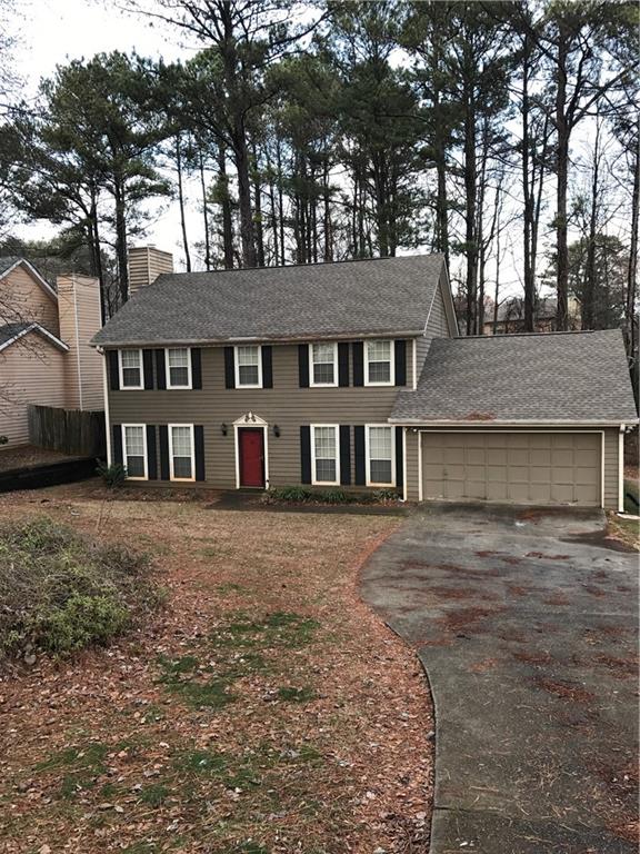 4548 Britt Road Tucker, GA 30084 - Photo 1 of 1 a front view of a house with a yard