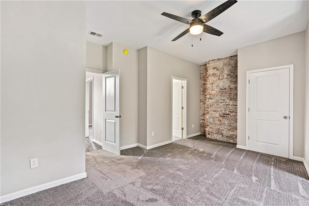 1127 Troy Hill Road Pittsburgh, PA 15212 - Photo 20 of 25 a view of empty room with ceiling fan