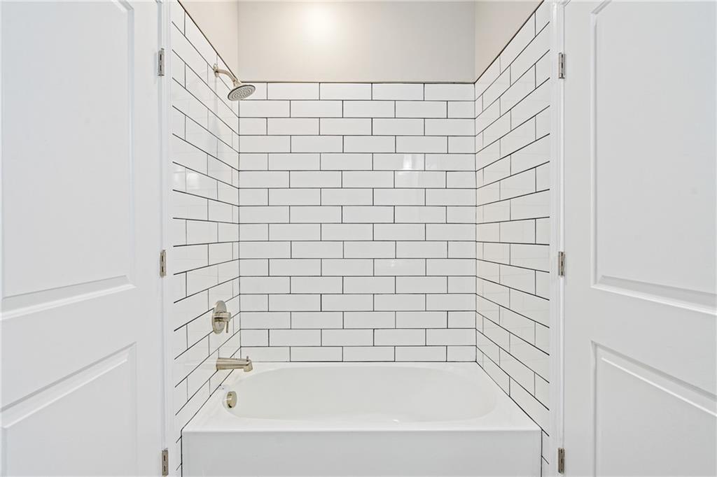 1127 Troy Hill Road Pittsburgh, PA 15212 - Photo 23 of 25 a bathroom with a bathtub