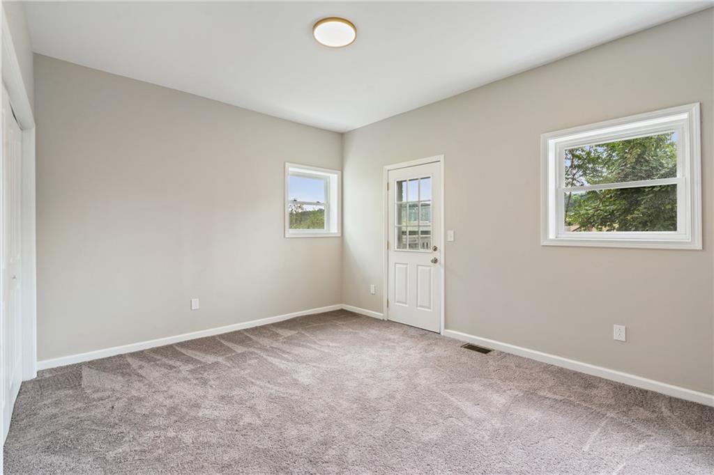1127 Troy Hill Road Pittsburgh, PA 15212 - Photo 9 of 25 an empty room with windows