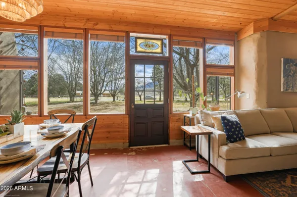 a living room with furniture and a window