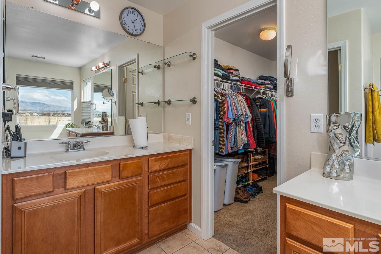 2241 Big Trail Circle Reno, NV 89521 - Photo 11 of 40 a bathroom with a sink double vanity