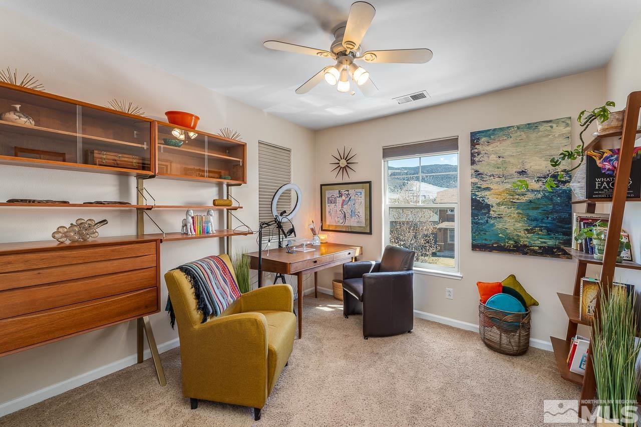 2241 Big Trail Circle Reno, NV 89521 - Photo 13 of 40 a living room with furniture and a large window