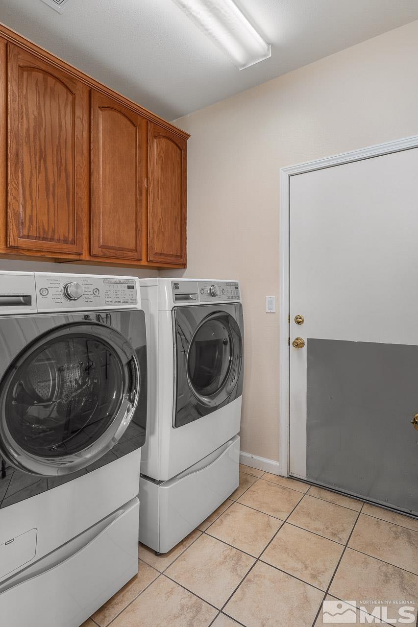 2241 Big Trail Circle Reno, NV 89521 - Photo 22 of 40 a utility room with dryer and washer
